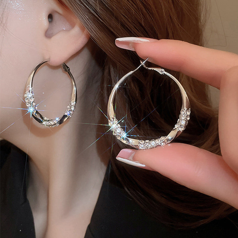 Luxury Twisted Rhinestone Earrings – Elegant, Sparkling & Timeless